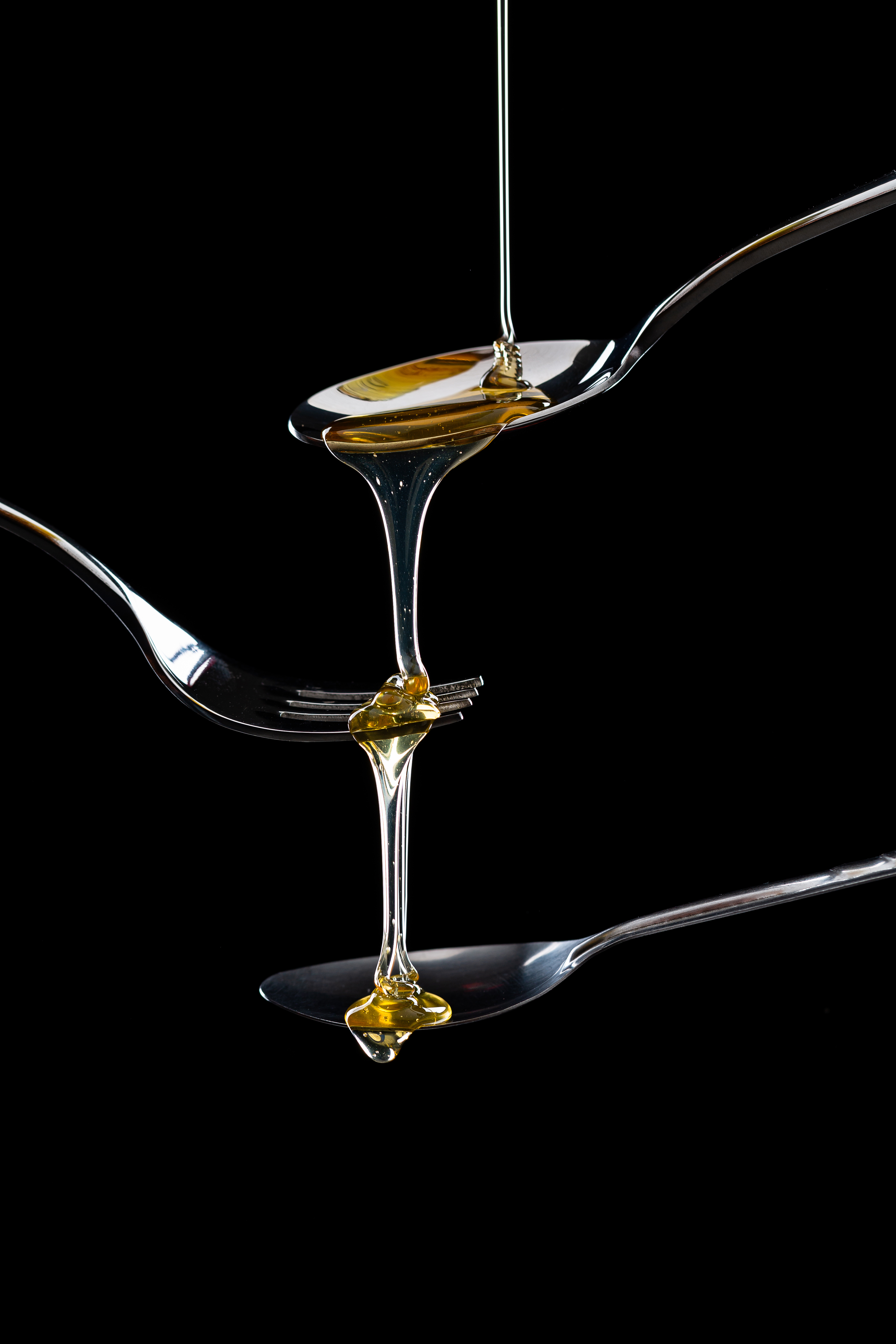 golden-sweet-honey-dripping-from-spoon.jpg